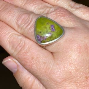 Hand crafted sterling silver and raw Atlantisite ring.